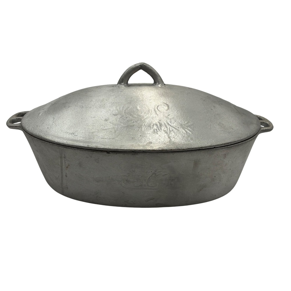 Vintage Cast Aluminum Oval Roaster Dutch Oven with Embossed Lid 15 Inch Silver